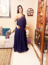 PRAKSIII IN RED ONE SHOULDER CAPE GOWN